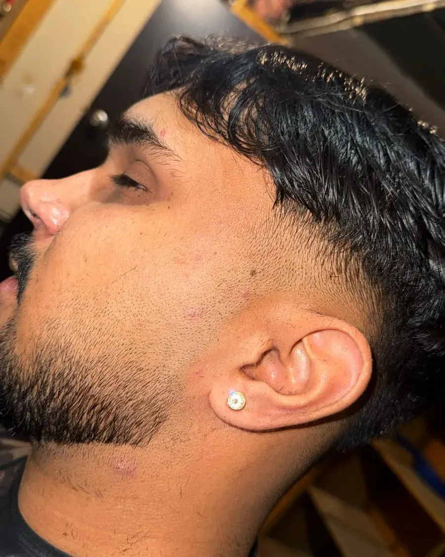 Beard shape-up and line-up — a cut finished at Amit Blends.