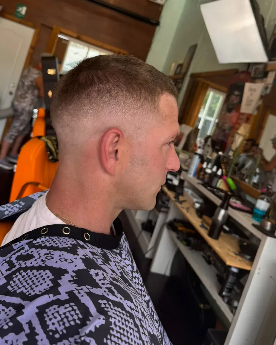 Mid skin fade, scissor top — a cut finished at Amit Blends.